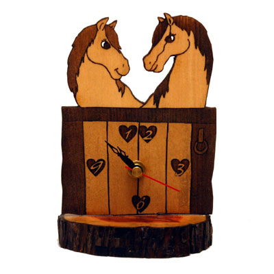 Reloj artesano de caballos